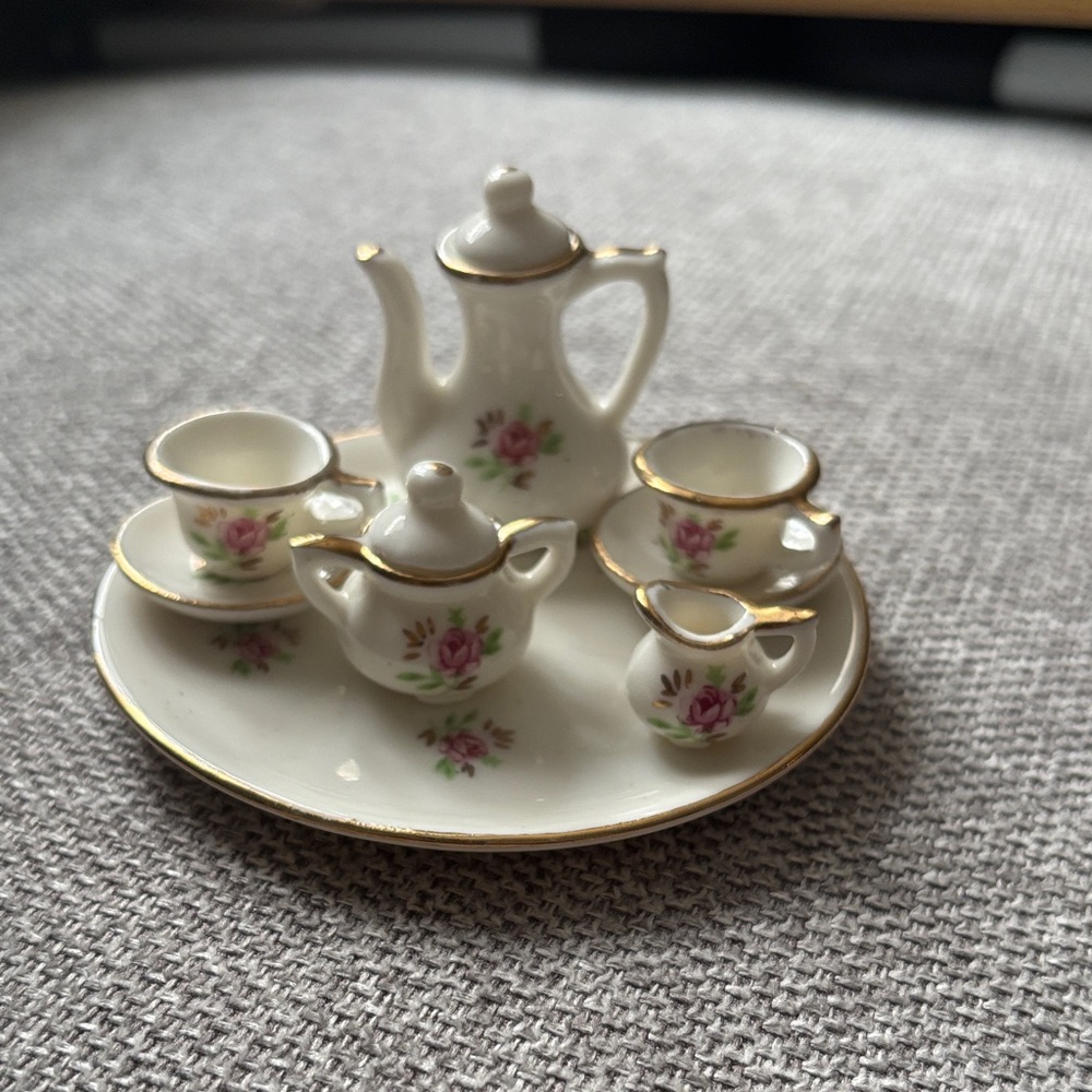 Floral Miniature Tea Set with Gold Accents is 15 Canadian Dollar